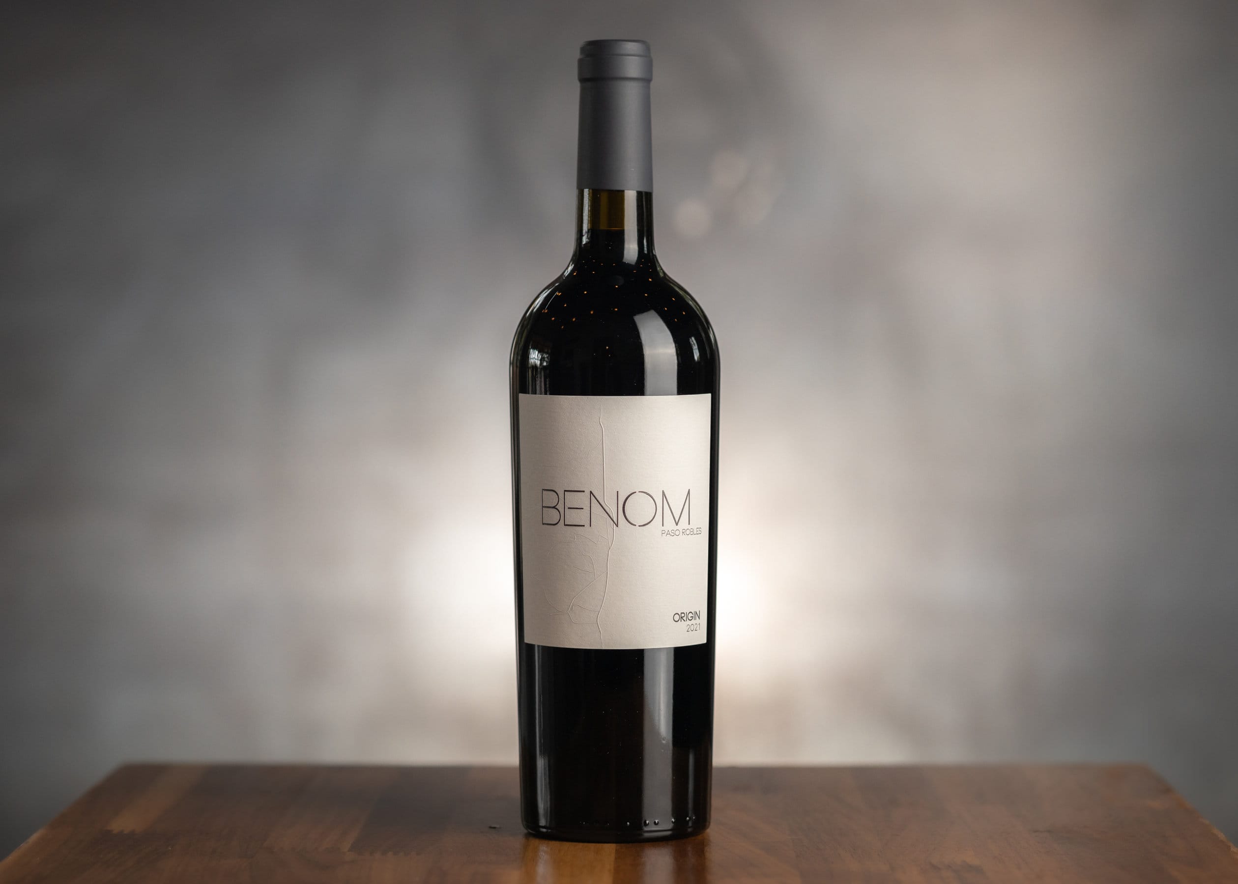 A bottle of 2021 Origin BENOM wine
