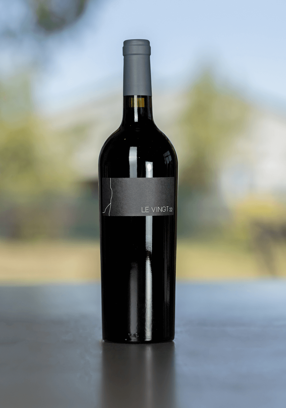 A bottle of 2022 Le Vingt BENOM wine